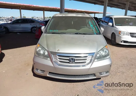 2009 Honda Odyssey Touring z USA, uszkodzony, nr VIN 5FNRL38819B021352